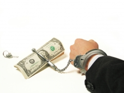 handcuffed_to_money.jpg